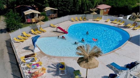 The swimming pool at camping Le verger de Jastres in Ardèche